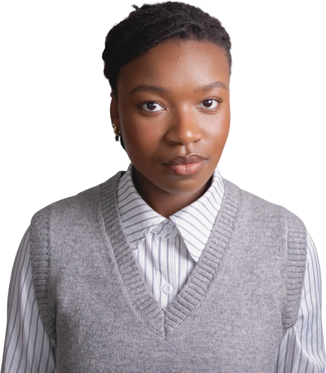 Erine Tchygnoumba, web designer, standing with her arms at her sides.